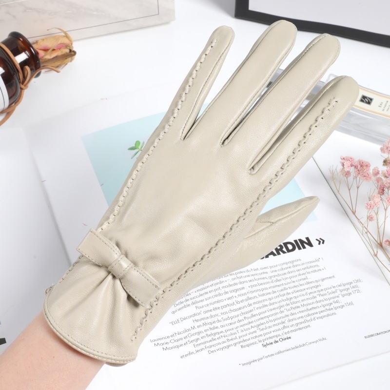 Женски ръкавици от овча кожа – корейски стил с панделка, джакардов гръб, топло усещане за допир, ветроустойчиви за шофиране и за дейности на открито през есенно‑зимния сезон.