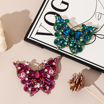 Ötvözetes pillangó bross, csepp olajos felülettel, könnyű luxus stílus, uniszex kiegészítő