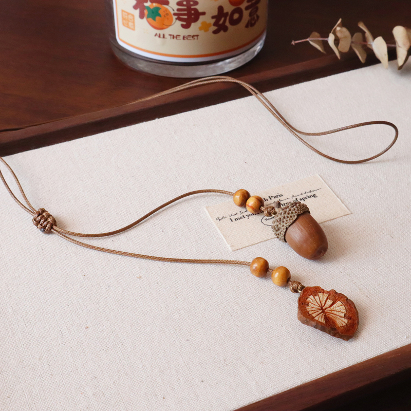 Garā džemperu ķēde Mori stilā ar ziedveida piekari, materiāls: riekstu čaula, sieviešu etniskais dizains, izlaidums 2025. gada rudenī