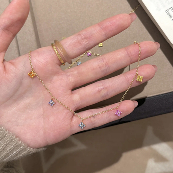 Set de bijuterii: colier și brățară cu trifoi cu patru foi, bază din cupru, zirconiu încrustat