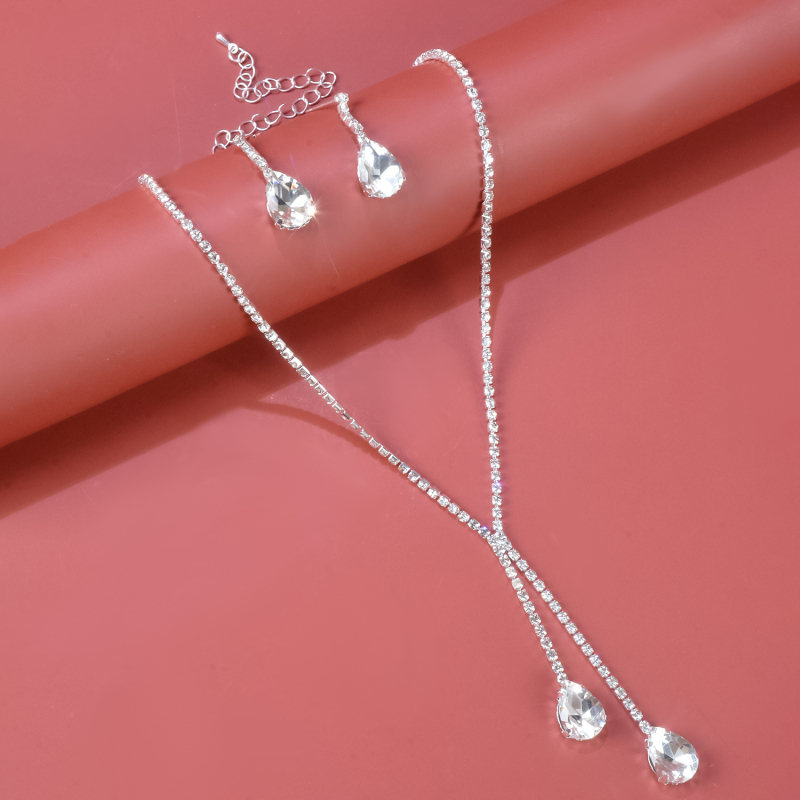 Ženski set nakita: naušnice + ogrlica rhinestone, Twist lanac (Materijal: Rhinestone; Tehnologija obrade: Set with diamonds; Set: Naušnice + Ogrlica; Dužina lanca: Twist chain; Uzorak: Ljubav/vodene kapljice/zvona)