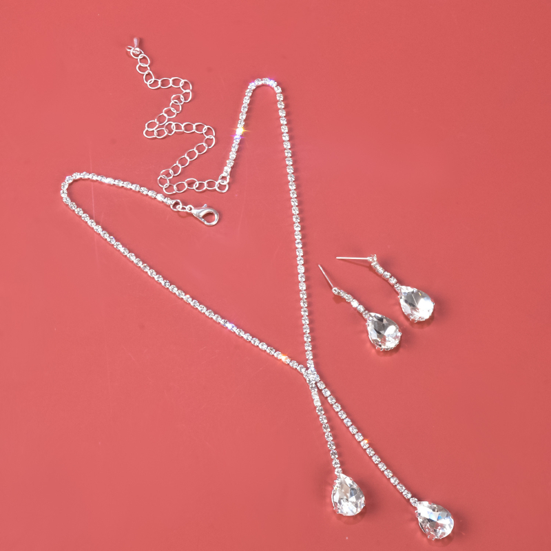 Ženski set nakita: naušnice + ogrlica rhinestone, Twist lanac (Materijal: Rhinestone; Tehnologija obrade: Set with diamonds; Set: Naušnice + Ogrlica; Dužina lanca: Twist chain; Uzorak: Ljubav/vodene kapljice/zvona)