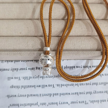 Ogrlica s privjeskom od srebra 999 na višeslojnom pletenom lancu, tehnika pletenja, unisex, stil vila