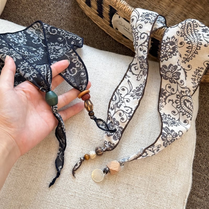 Maca Baka etnički šal za glavu s oblikom kešu cvijeta, jesen 2025