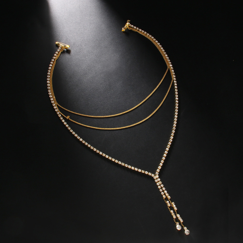 Moteriška daugiasluoksnė nugaros grandinė su kutais - vario lydinys, elektroplakavimas, mozaikiniai dirbtiniai akmenys, pritaikoma apdorojimo