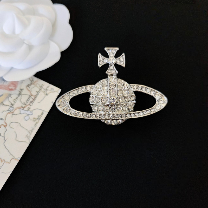 Segu koostisest broš planeet stiiliga ja teemantidega paigutus, universaalne moekas aksesuaar, sügisel 2023