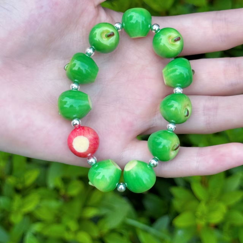 Brățară în formă de măr, unisex, design original, plastic/rășină, set de 11 bucăți.