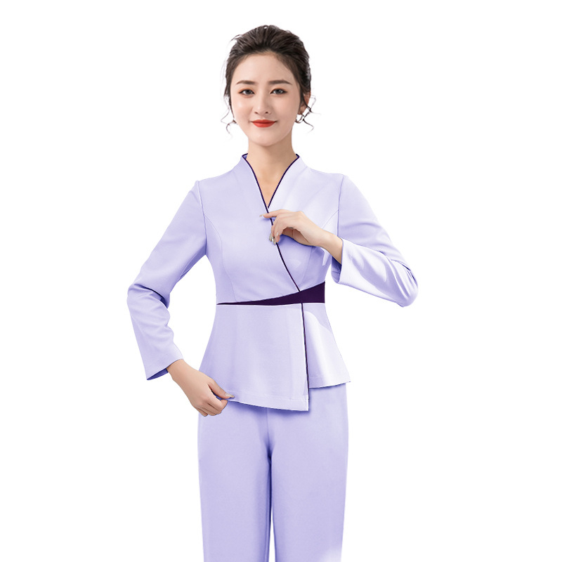 Grožio salono uniformos komplektas: talijos formuojantis viršus ir elastinės kelnės, drėgmę šalinantis poliesteris, trumpomis rankovėmis, V formos kaklelis, visoms sezonoms