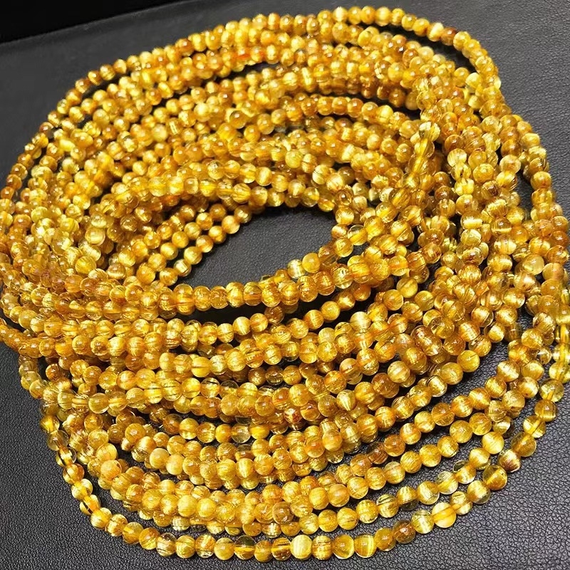 Narukvica od zlatnog kristala, unisex, perle 20 mm i više, polirani završetak, etnički stil