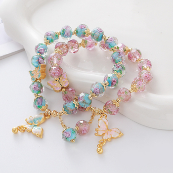 Női kézműves karkötő üveg- és lazurit gyöngyökkel, pillangó medállal, hercegnő-stílusú ékszer