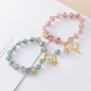 Női kézműves karkötő üveg- és lazurit gyöngyökkel, pillangó medállal, hercegnő-stílusú ékszer