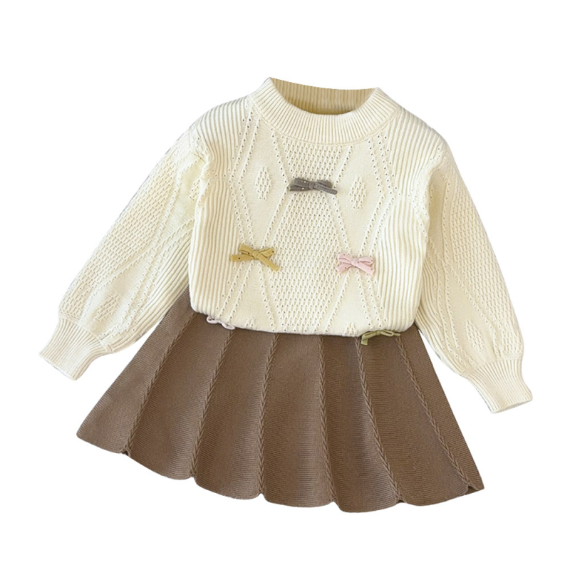 Set pentru copii din două piese: pulover tricotat în stil coreean cu funda și fustă asortată; mâneci lungi, guler rotund; culoare solidă; material acrilic; pentru copii între 3 și 8 ani; toamnă/iarnă.