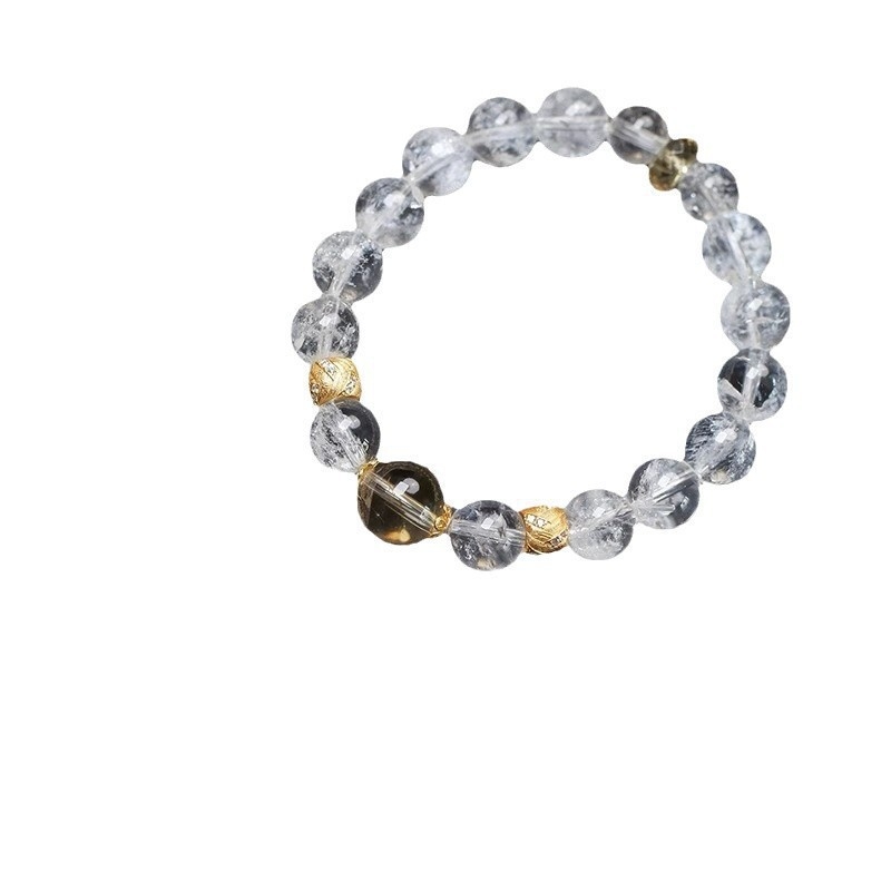 Fehér kristály karkötő, citrin oldalkövek, ezüst- és aranyozott bevonat, könnyed luxus stílus