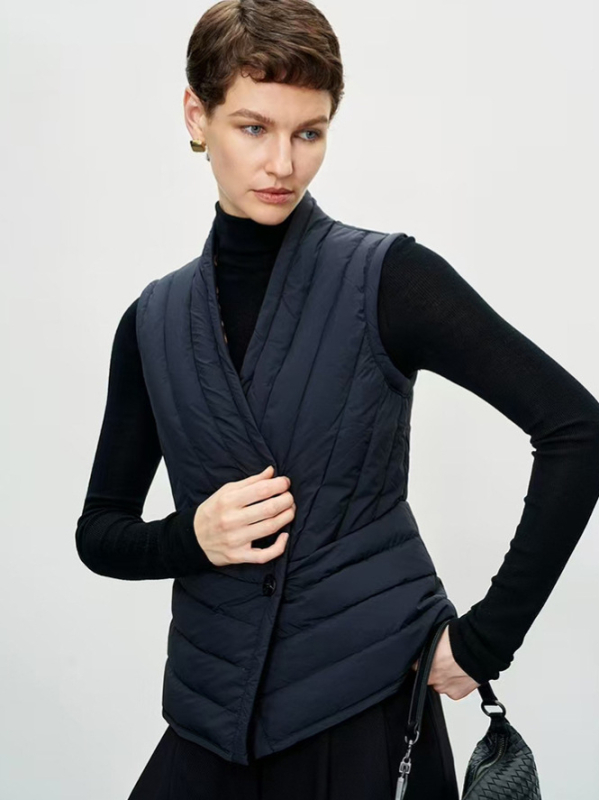 Ženski prsluk od gusjeg Downa, vanjski materijal Nylon, punjenje: gusje Down, sadržaj Down 91–95%, stil: elegantan za svakodnevno putovanje, normalna duljina