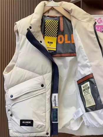 Vyrinė pūkų liemenė su stovinčia apykakle, užtrauktukas, didelės kišenės, atspari vandeniui, žiemos darbo drabužiai