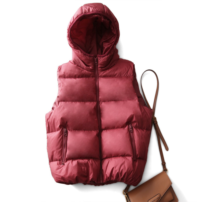 Ženska down vest s najlonom; punilo: bijeli goose down; debljina: debela; kapacitet punjenja: 101–200 g; duljina: obična (50–65 cm)