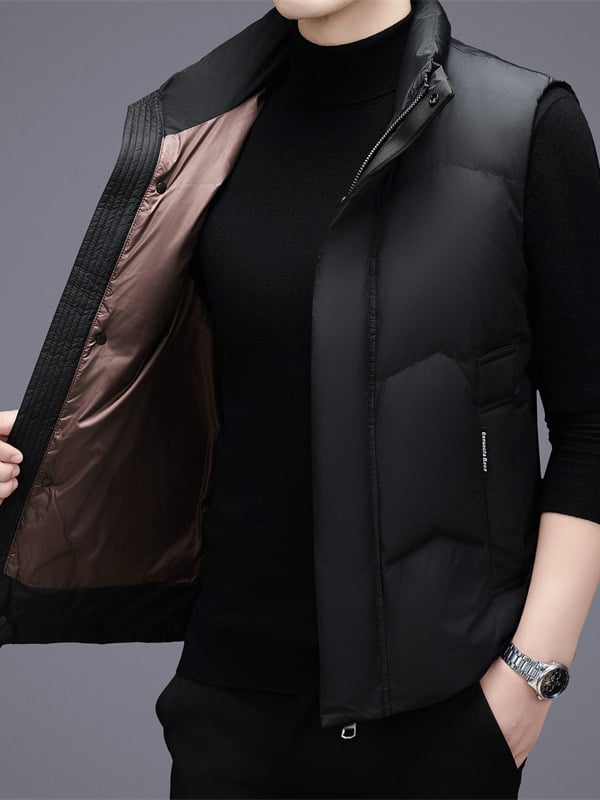 Vīriešu dūnu veste ar stāva apkakli, priekšējais rāvējslēdzējs, 86–90% dūnu saturs, 71–96 g pildījums, rudens–ziemas sezona