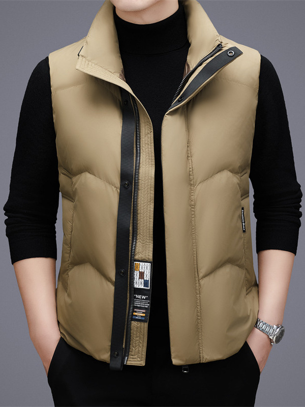 Vīriešu dūnu veste ar stāva apkakli, priekšējais rāvējslēdzējs, 86–90% dūnu saturs, 71–96 g pildījums, rudens–ziemas sezona