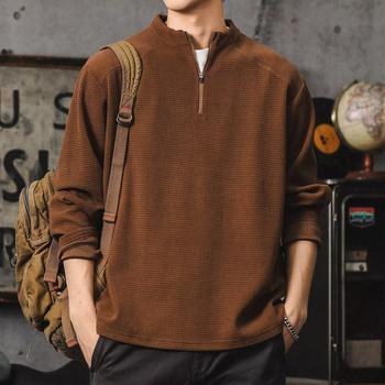 Álló galléros félzip pulóver, poliészter-domináns pamut keverék anyag, hosszú ujjak, laza szabás, kapucni nélküli, bélés nélkül, egyszínű, tavaszra és őszre