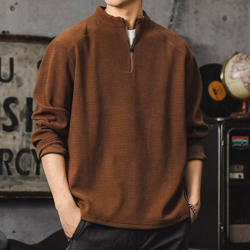 Álló galléros félzip pulóver, poliészter-domináns pamut keverék anyag, hosszú ujjak, laza szabás, kapucni nélküli, bélés nélkül, egyszínű, tavaszra és őszre