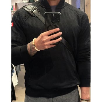 Alapréteg edzéshez fél-zip felső, álló gallér, laza szabás, hosszú ujjú, oldalsó cipzáras zsebek