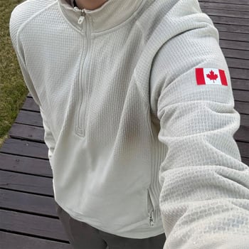 Alapréteg edzéshez fél-zip felső, álló gallér, laza szabás, hosszú ujjú, oldalsó cipzáras zsebek