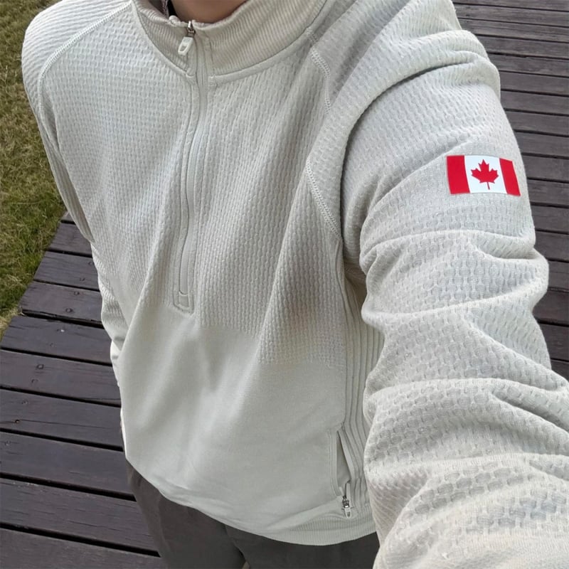 Alapréteg edzéshez fél-zip felső, álló gallér, laza szabás, hosszú ujjú, oldalsó cipzáras zsebek