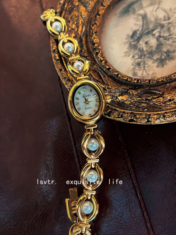 LSVTR Dámske kvarc hodinky s náramkom z imitovaných perál, Seagull pohon (Japonsko), 30M vodotesnosť, oválny ciferník, puzdro a remienok zliatiny