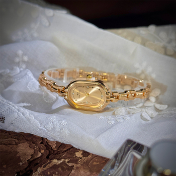 Ženski kvarcni sat s ovalnim brojčanikom, jednostavan retro stil (Pogon: kvarc; Brojčanik: ovalni; Kućište: smjesa materijala; Remen: legura; Kopča: nehrđajući čelik)