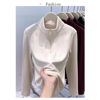 Pulover s polu-zipom i stojećim ovratnikom, dvostruki velur, dugi rukavi; poliester/elastan (90-95% poliester, 30-50% elastan); standardna kroj