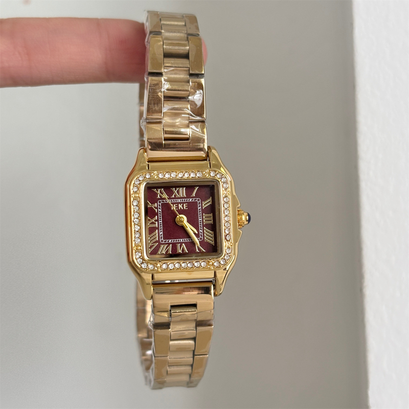 Ieke női kvarcóra, négyszögletes számlap, fém tokozás, rozsdamentes acél szíj, spirál koronával