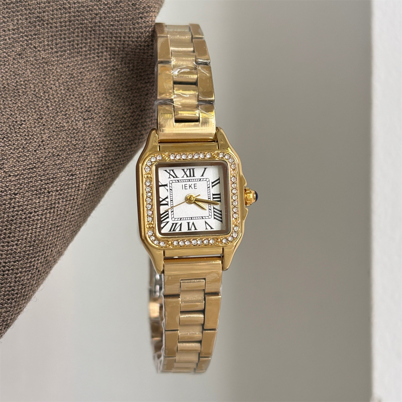 Ieke női kvarcóra, négyszögletes számlap, fém tokozás, rozsdamentes acél szíj, spirál koronával