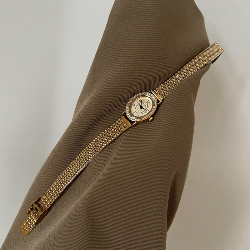 NAIDU női kvarc karóra ovális számlappal, analóg kijelző, ötvözetes tok, spirál korona