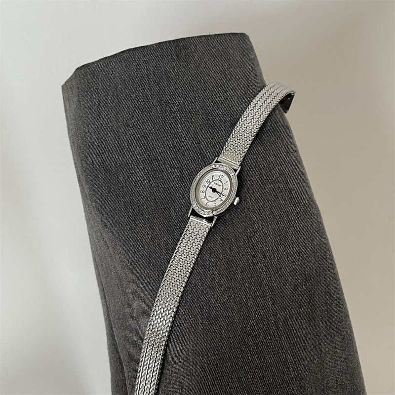 NAIDU női kvarc karóra ovális számlappal, analóg kijelző, ötvözetes tok, spirál korona