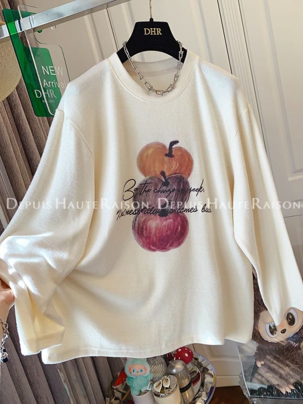 Tricou T cu mâneci lungi, croială lejeră, imprimeu floral, poliester 70–80%, guler rotund, lungime medie.