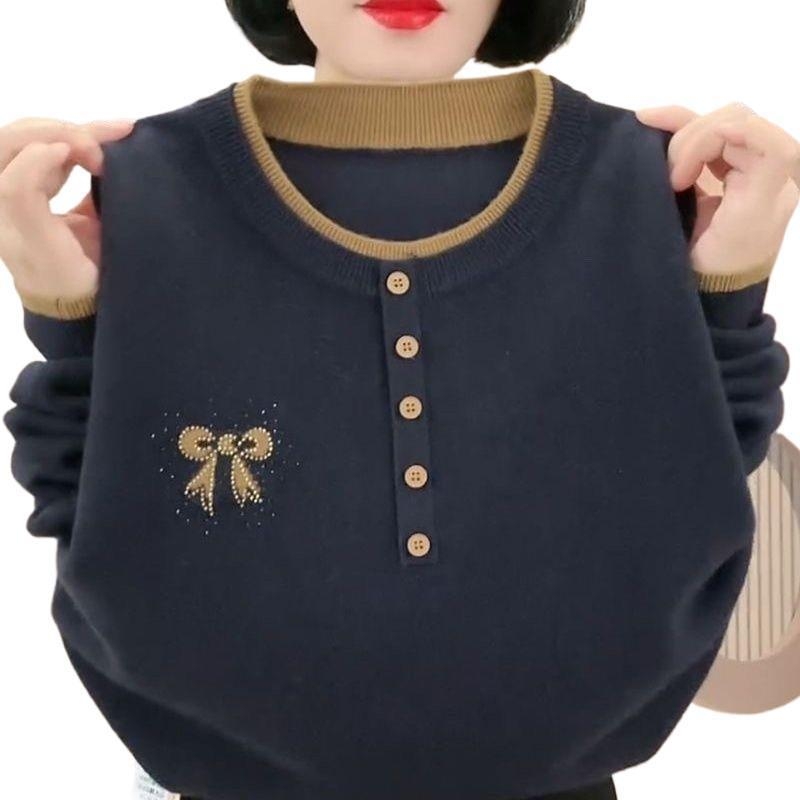 Pulover tricotat brodat, guler rotund, croială lejeră, mâneci trei sferturi, cusături încrucișate în culori - stil chinezesc.