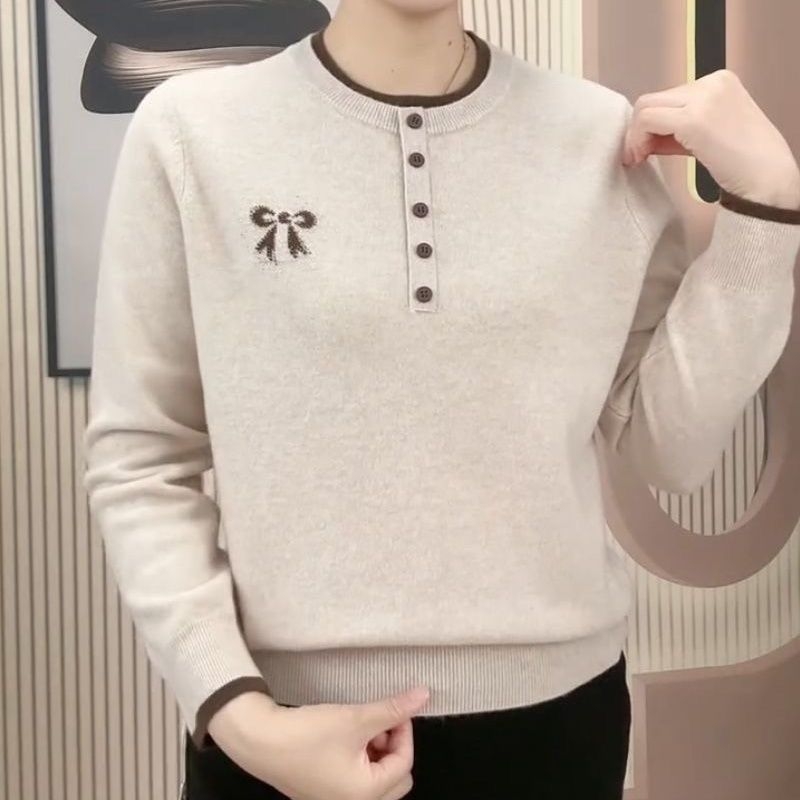 Pulover tricotat brodat, guler rotund, croială lejeră, mâneci trei sferturi, cusături încrucișate în culori - stil chinezesc.