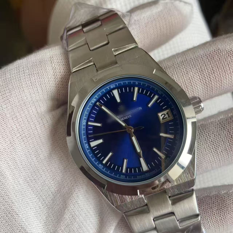 Férfi acél szíjas óra, naptár és a hét nap kijelzése, mechanikus működés, pillangócsattal, 10 m vízálló, ásványi üveg