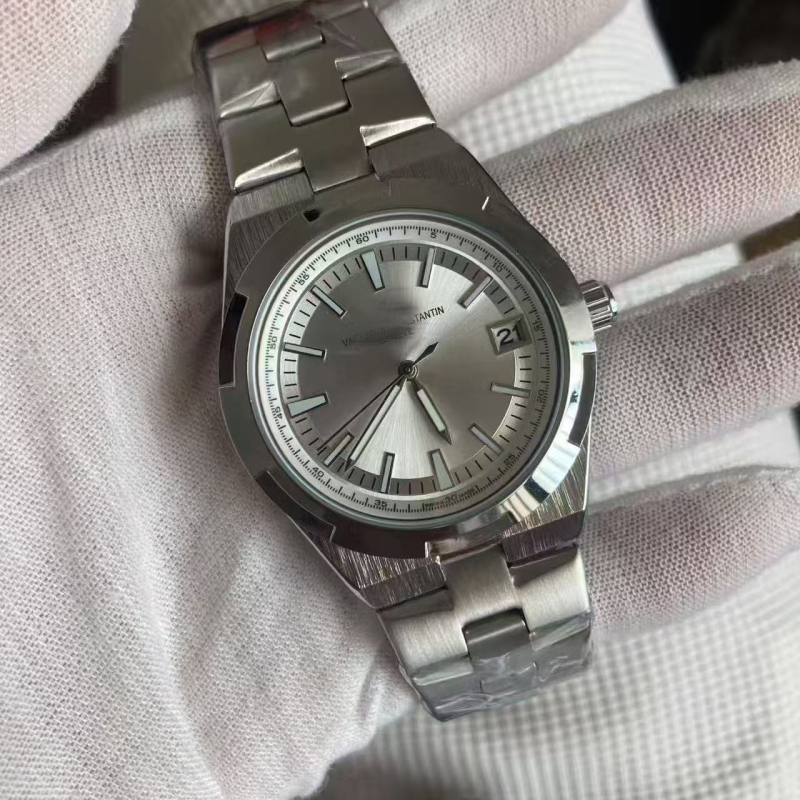 Férfi acél szíjas óra, naptár és a hét nap kijelzése, mechanikus működés, pillangócsattal, 10 m vízálló, ásványi üveg