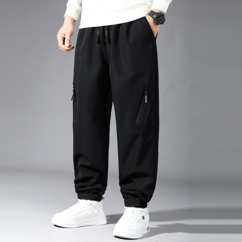 Meeste Softshell joggerid fleecevoodriga, tuule- ja veekindlad, vaba lõige, keskmine talje — Talv 2025