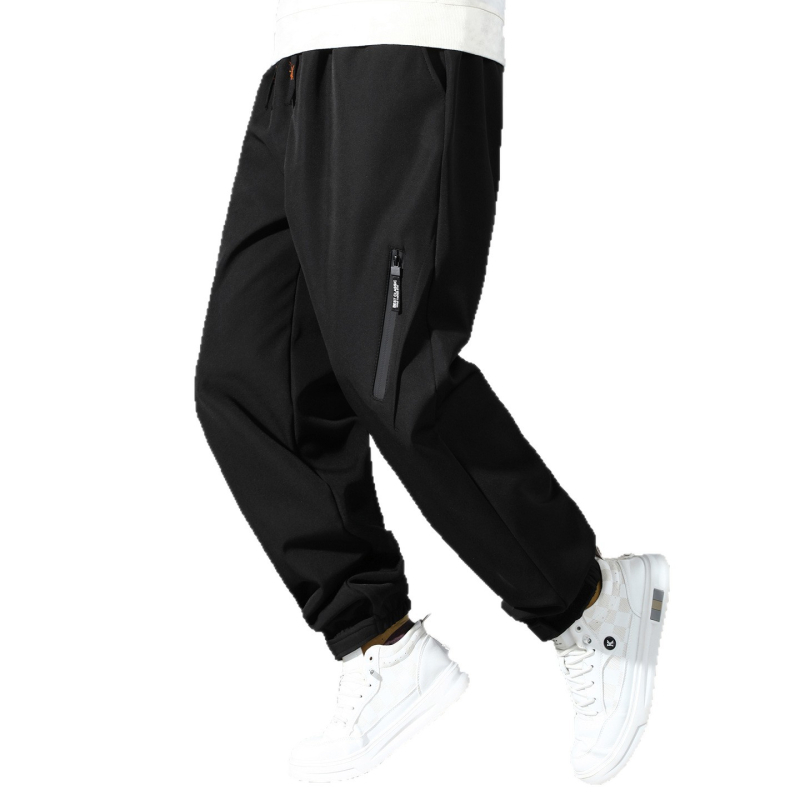 Meeste Softshell joggerid fleecevoodriga, tuule- ja veekindlad, vaba lõige, keskmine talje — Talv 2025