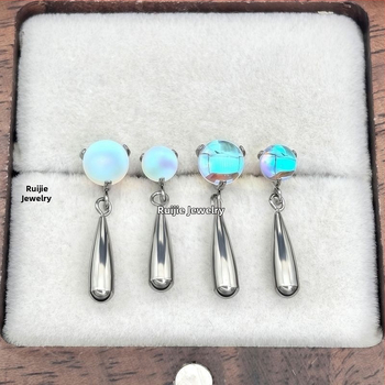 Pilienveida auskari no titāna sakausējuma F136, mēness akmens ar dimanta griezumu