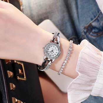 DZG Ženski kvarcni sat s spiralnom krunom, okruglim brojčanikom, metalnim kućištem, remenom od legure, svjetsko vrijeme