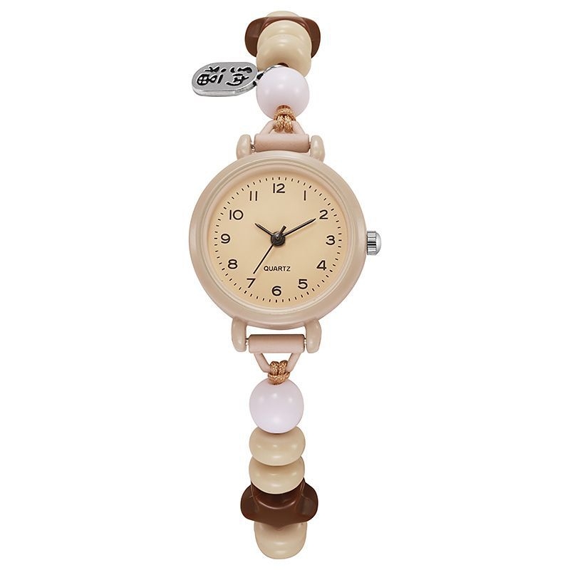 Kvarc analóg karóra kis kör alakú számlappal, műanyag tokkal, szövött szíjjal 063