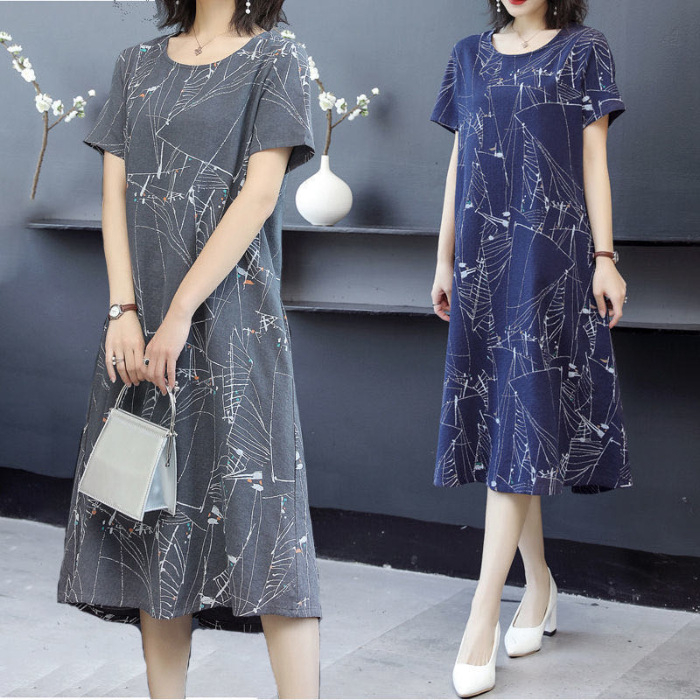 Milk Silk midi haljina, opušteni struk, kratki rukavi, okrugli izrez, otisak, ljetni gradski ležerni stil.