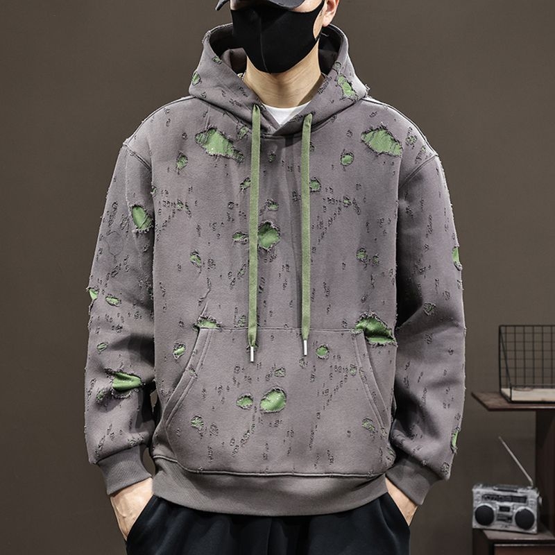 Razderani hoodie pulover s kapuljom, pamuk 51-70%, labav kroj, bočni džepovi, jesen 2025
