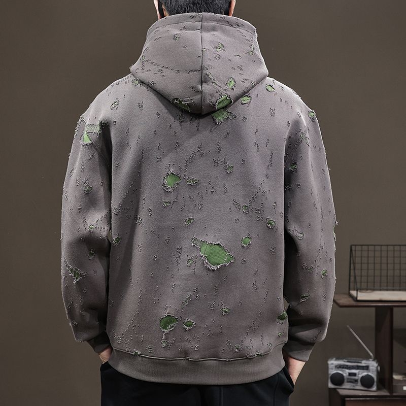 Razderani hoodie pulover s kapuljom, pamuk 51-70%, labav kroj, bočni džepovi, jesen 2025