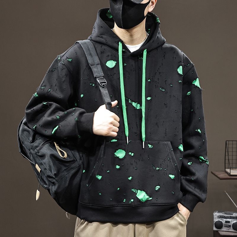 Razderani hoodie pulover s kapuljom, pamuk 51-70%, labav kroj, bočni džepovi, jesen 2025