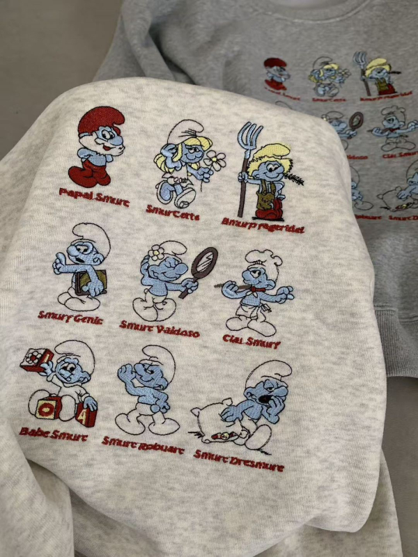 Ženski fleksi kapuljača od flisa s izvezenim Smurf motivom, slobodan kroj, dugi rukavi, pamut-poliester mešavina, zima 2025