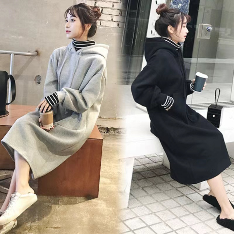 Női polár béléses vastag pulóverruha kapucnival, laza szabású, imitált két-darabos megjelenés, poliészter.